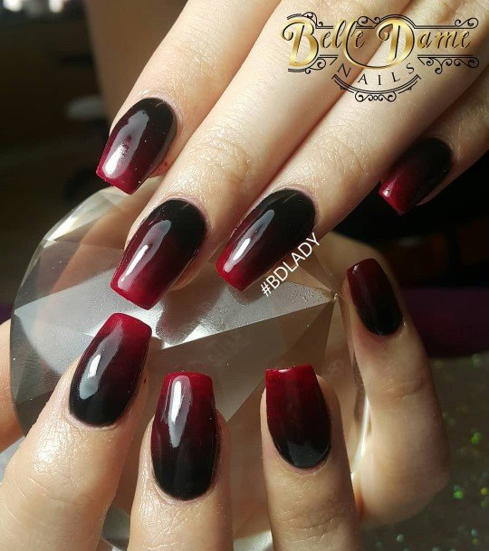 Woman With Red Ombre Nail