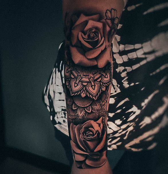 Woman With Rose Forearm Tattoo