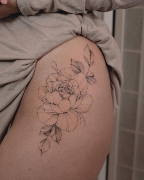 Woman With Rose Thigh Tattoo