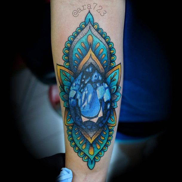 Woman With Sapphire Tattoo
