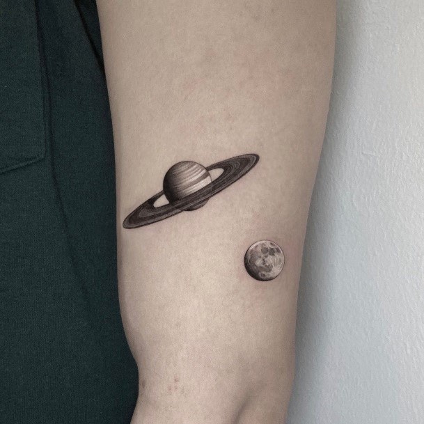 Woman With Saturn Tattoo