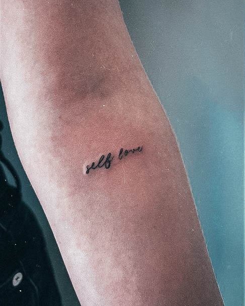 Woman With Self Love Tattoo