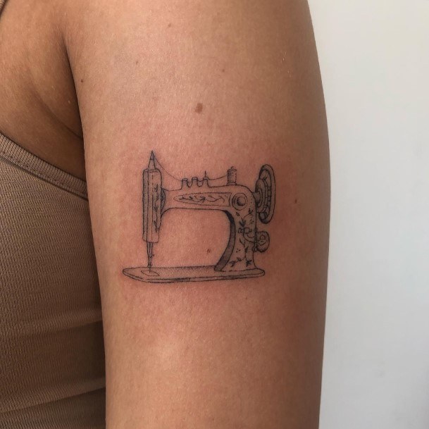 Woman With Sewing Machine Tattoo