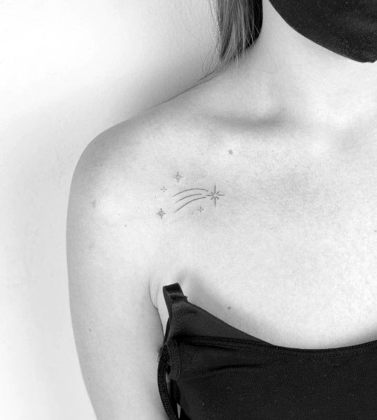 Woman With Shooting Star Tattoo