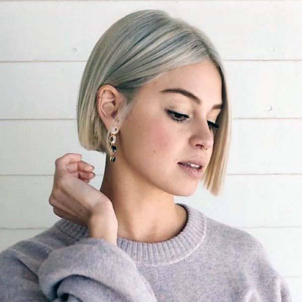 Woman With Short Straight Blonde Bob Hairstyle Hassle Free Trendy