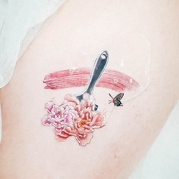 Woman With Small Flower Tattoo