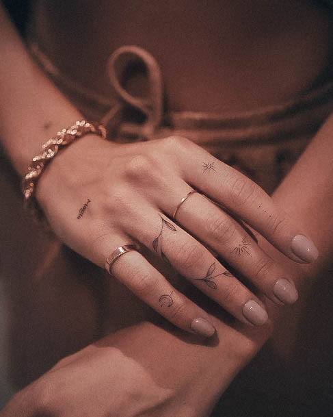 Woman With Small Hand Tattoo