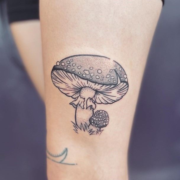 Woman With Small Mushroom Tattoo