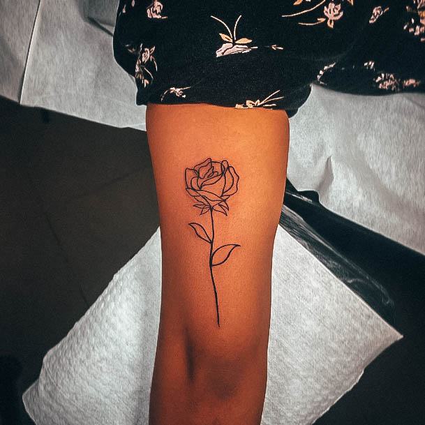 Woman With Small Rose Tattoo