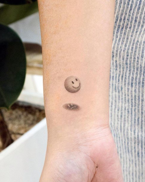 Woman With Smiley Face Tattoo