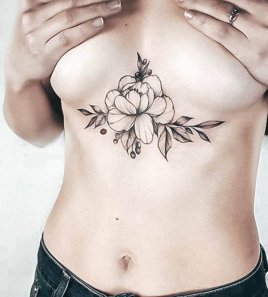 Woman With Sternum Tattoo
