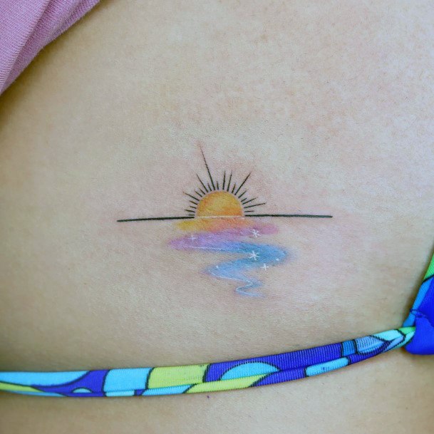 Woman With Sunset Sunrise Tattoo