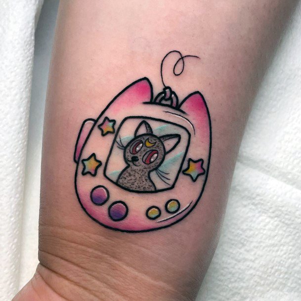 Woman With Tamagotchi Tattoo