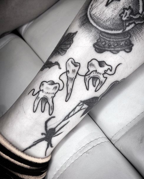 Woman With Tooth Tattoo