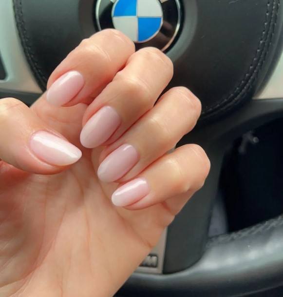 Woman With Translucent Pink Nail