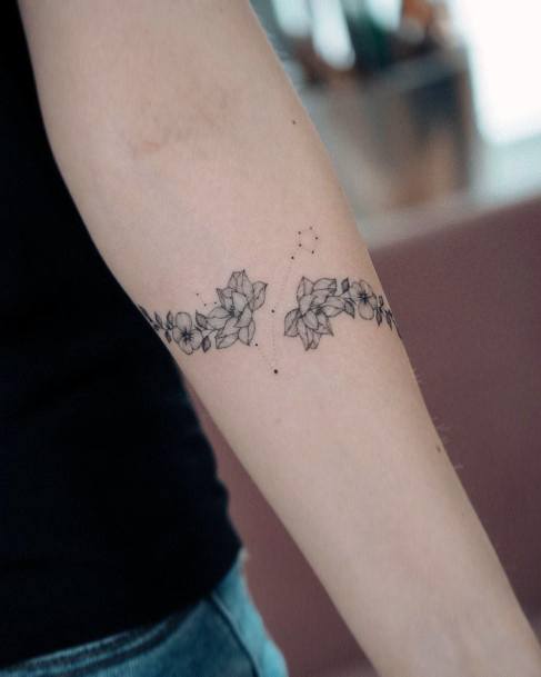 Woman With Water Lily Tattoo