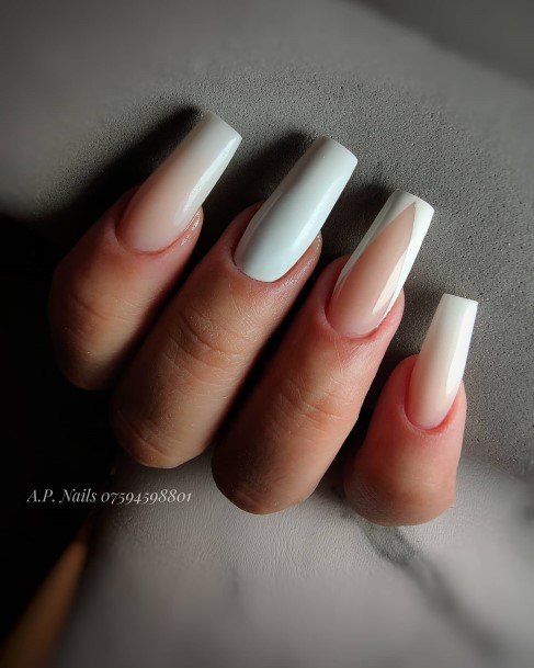 Woman With White And Nude Nail