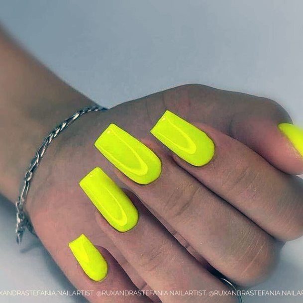 Woman With Yellow Summer Nail