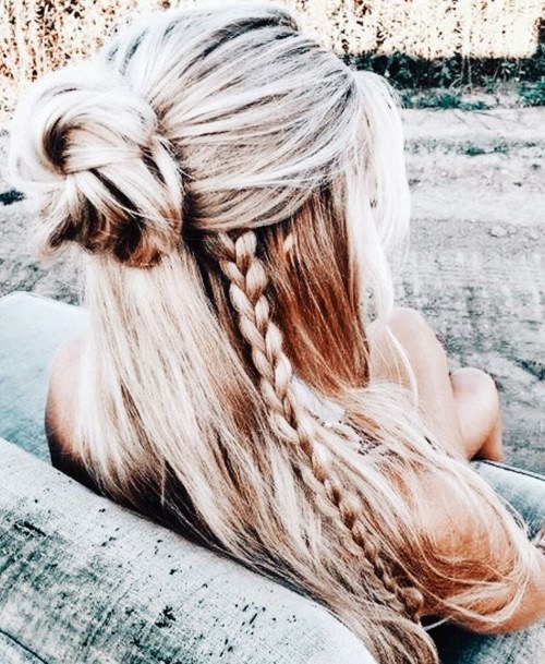 Womans Blonde Hair With One Braid And Top Knot Hairstyle