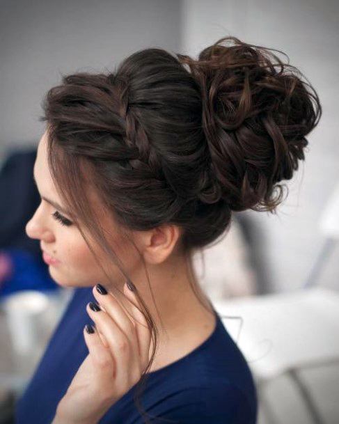 Women Updo With Loose Crown Braid And Curled High Bun