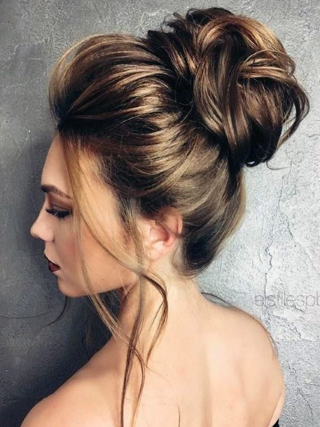 Women With Chocolate Brown Hair And Easy Mid Head Bun