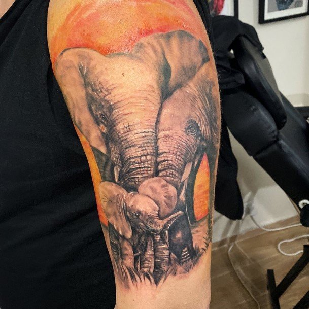 Womens Arms Elephant Family Tattoo