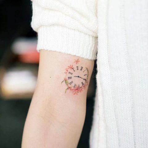 Womens Arms Small Clock Tattoo