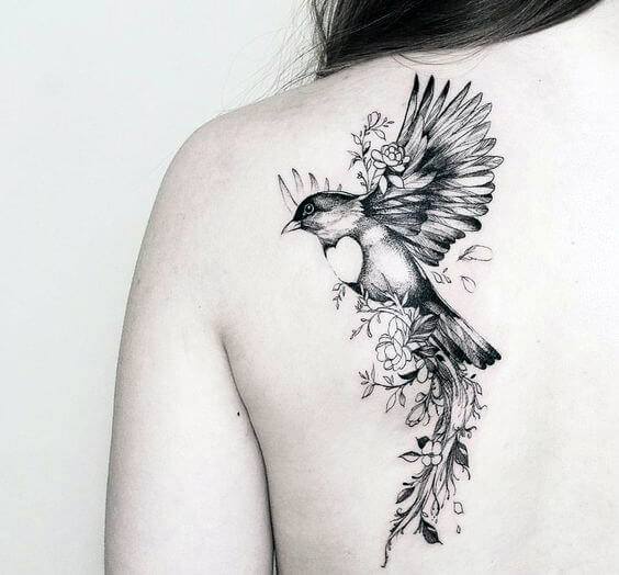 Womens Back Large Feathered Bird Tattoo
