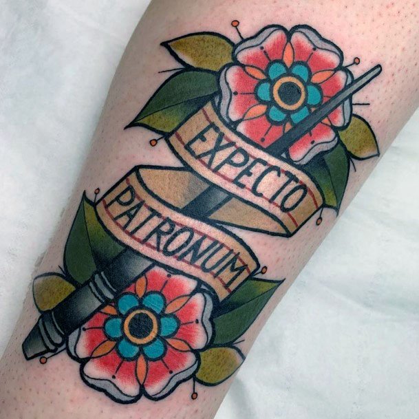 Womens Banner And Floral Tattoo American Traditional