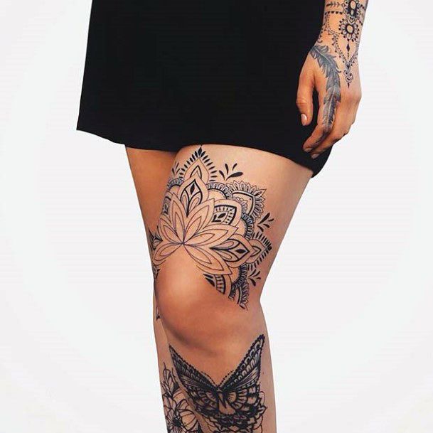 Womens Black Design Tattoo On Legs
