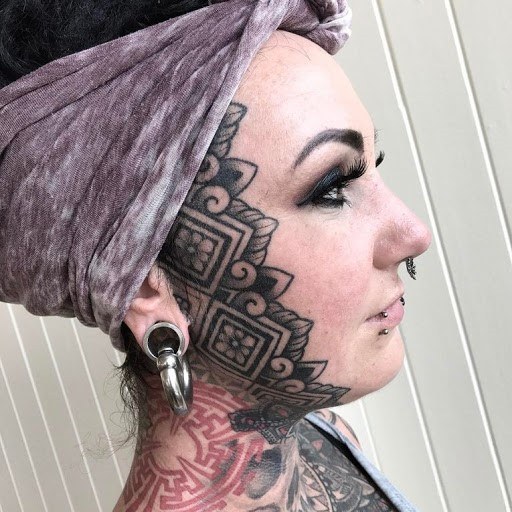 Womens Black Diamond Shaped Tattoo Face