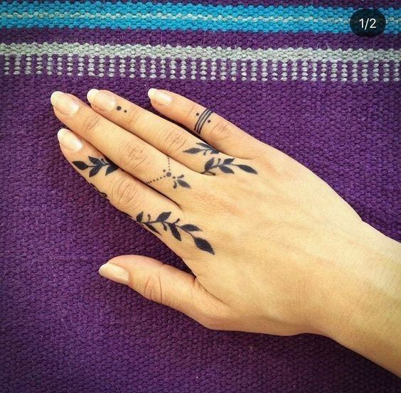 Womens Black Leafy Finger Tattoo