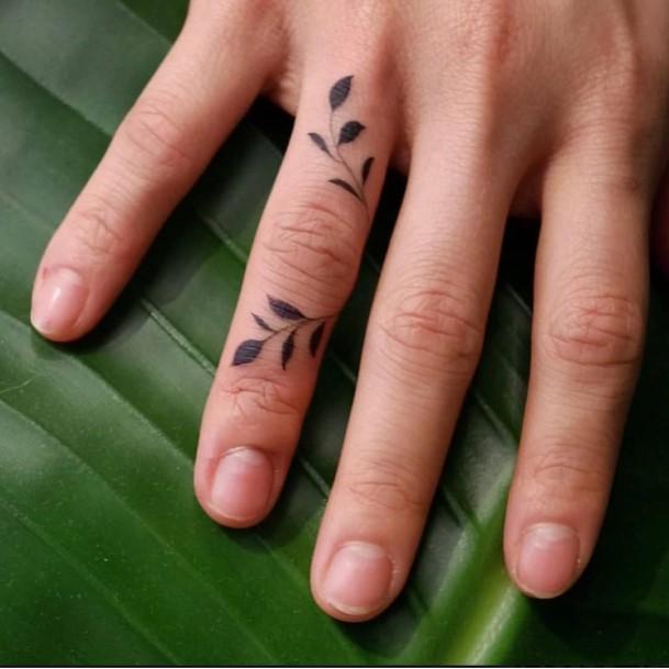 Womens Black Small Leaves Tattoo On Fingers