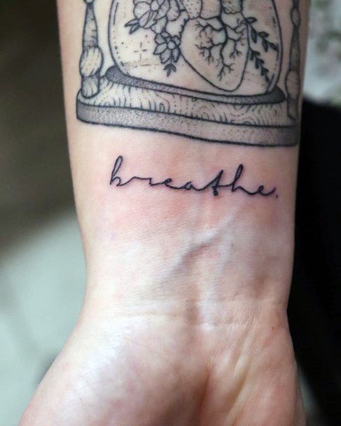 Womens Breathe Tattoo On Wrist