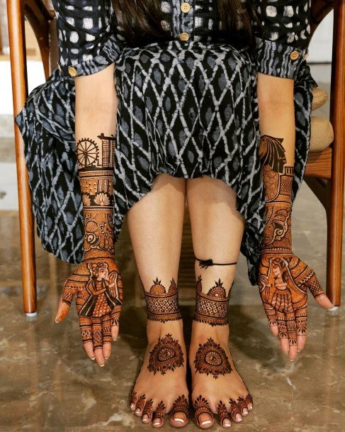 Womens Bright Henna Tattoo On Hands