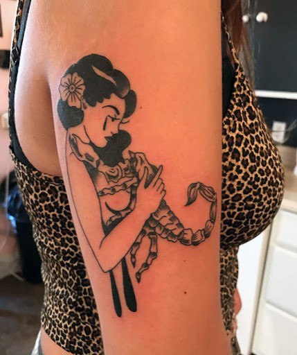 Womens Caressing A Scorpion Tattoo Womens Arms