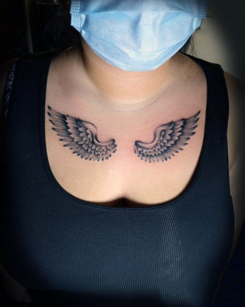 Womens Chest Angel Wing Tattoo