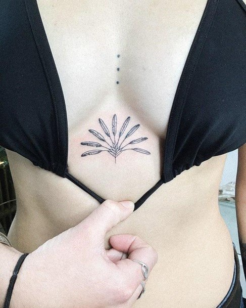 Womens Chest Small Long Leaved Plant Tattoo