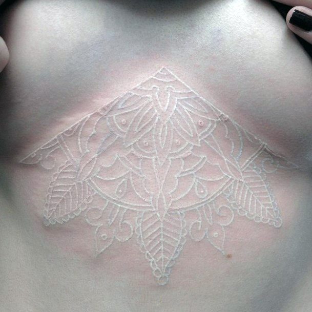 Womens Chest White Ink Design Tattoo