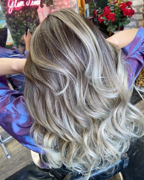 Womens Current Hairstyles Platinum Highlighted Wavy Cut