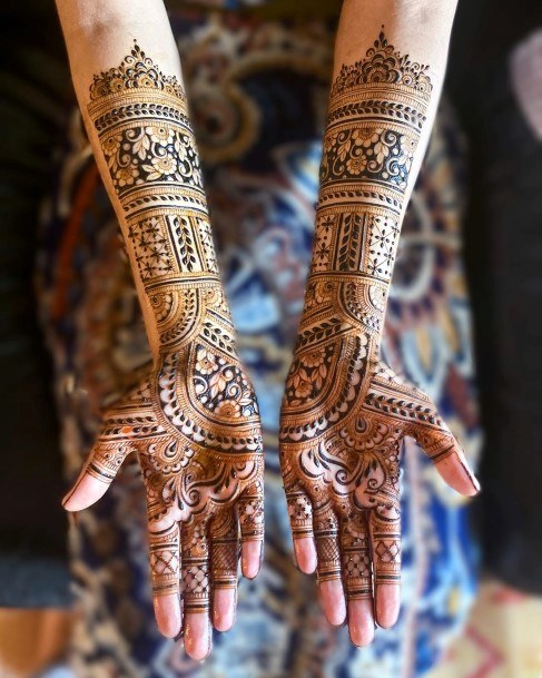 Womens Decorative Henna Tattoo On Arms