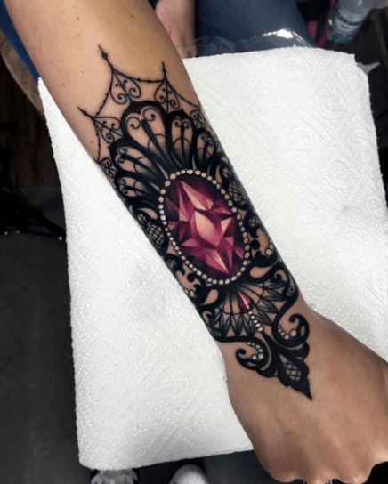 Womens Enticing Pink Gem And Black Tattoo Forearms
