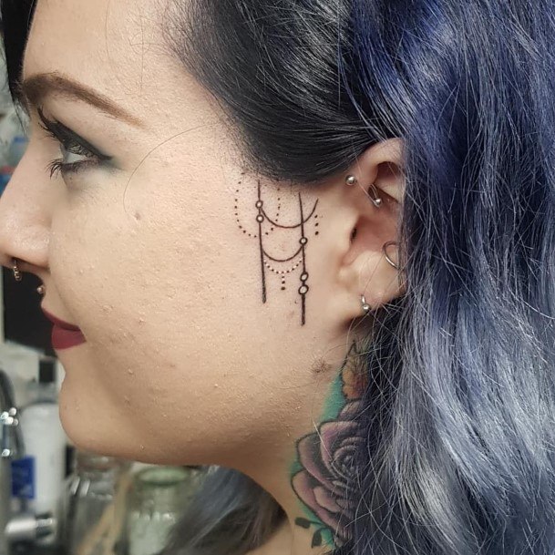 Womens Face Dots And Lines Tattoo