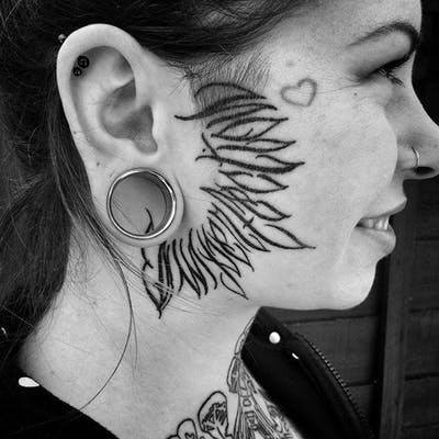 Womens Face Large Thin Black Leaves Tattoo