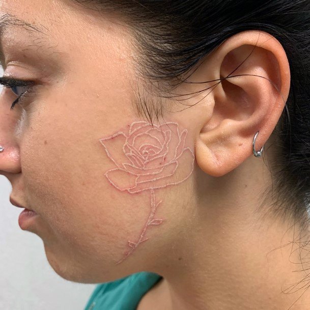 Womens Face White Ink Rose Tattoo