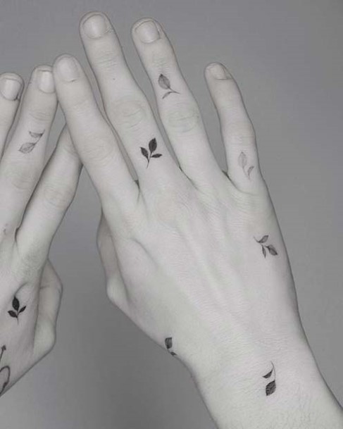 Womens Fingers Leaves Tattoo