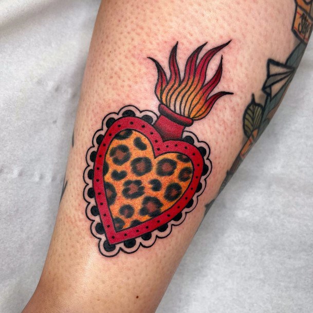 Womens Flaming Heart Tattoos