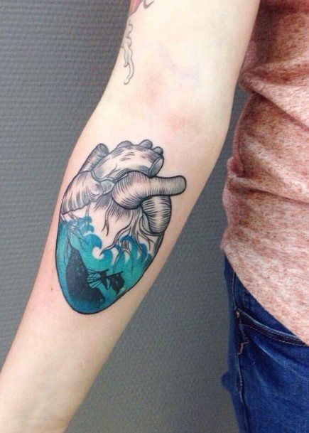 Womens Forearms Anatomical Heart Blue Waves Tattoo