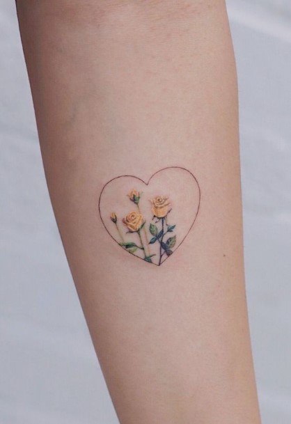 Womens Forearms Yellow Roses And Heart Tattoo