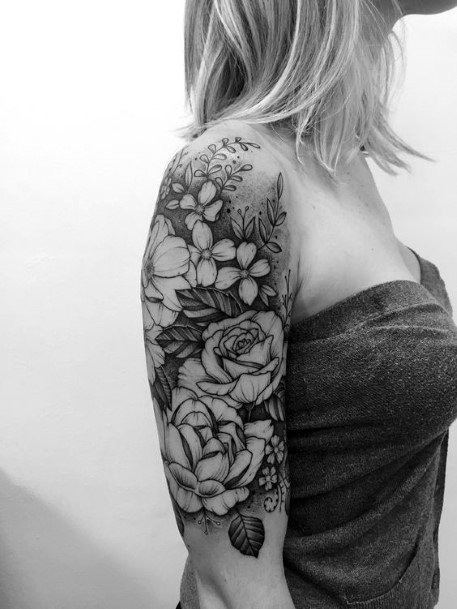 black and grey flower sleeve tattoos